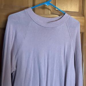 Sweater/top with draw string bottom.